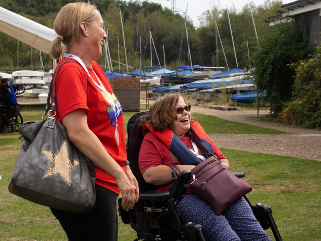 Staff members Katy and Angie smiling at a Get More Active Get Together sailing event