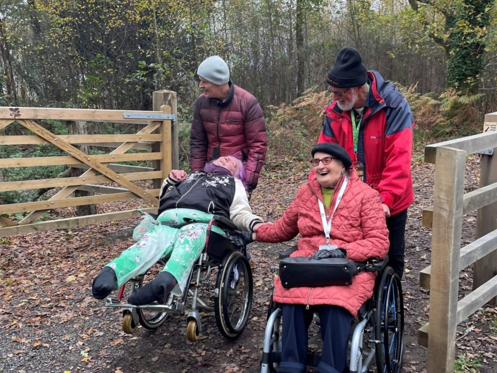 Coalition members wheeling and walking at the National Trust site, Devil’s Punchbowl