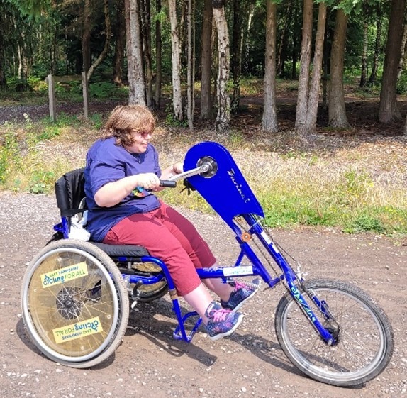 Angie on a handcycle bike 