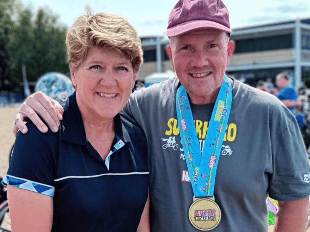 Coalition member Graham with Clare Balding at the Superhero Tri event.